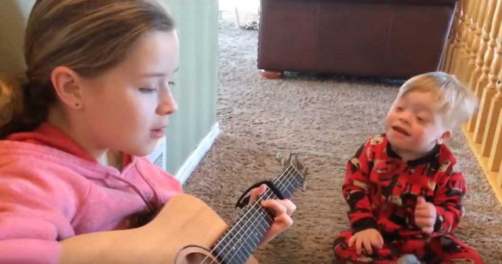 Big Sister Sings 'You Are My Sunshine' To Brother With Down Syndrome