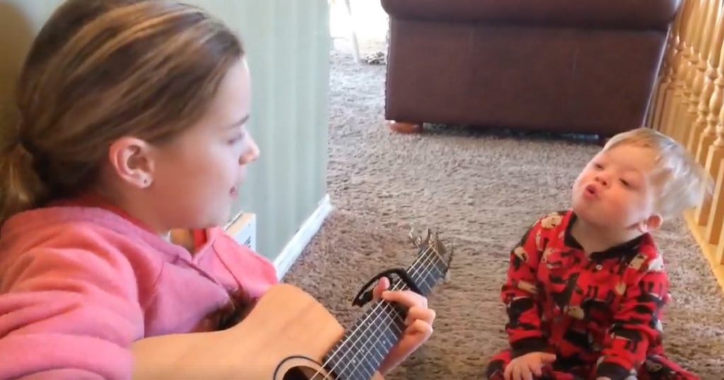 Big Sister Sings 'You Are My Sunshine' To Brother With Down Syndrome