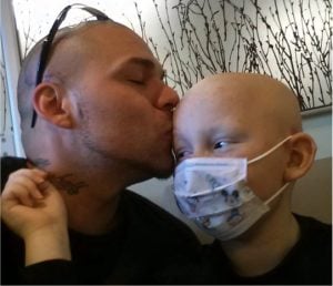 godupdates dad gets tattoo to match son's cancer surgery scar