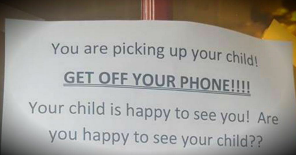 godupdates day care's sign for parents to get off phone goes viral fb