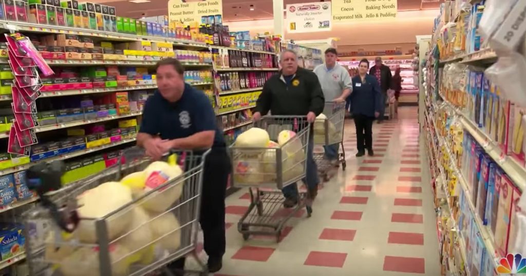 Firefighters Help Families In Need At Thanksgiving