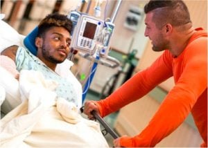 godupdates football star tim tebow visits friend in hospital 2