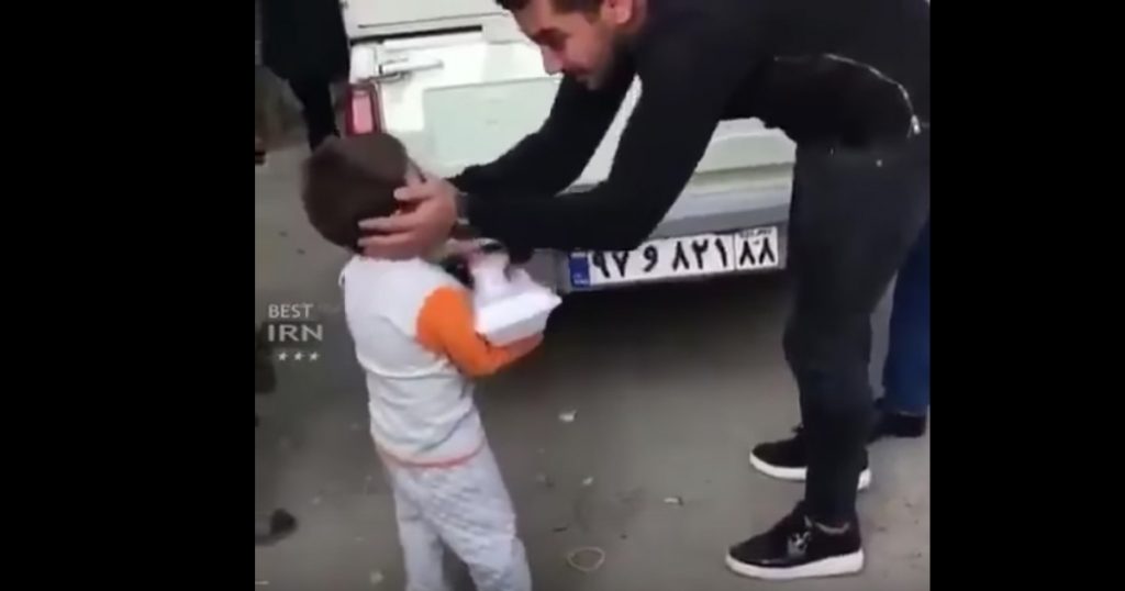 Boy Helps Girl Get Food After Earthquake