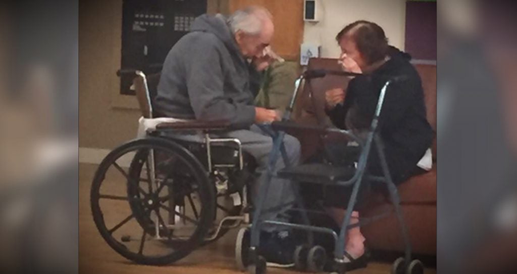 godupdates photo of elderly couple crying as sent to separate nursing homes fb