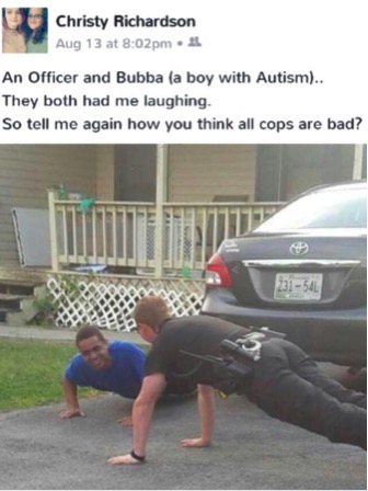 godupdates police officer does push-ups to calm boy with autism 4