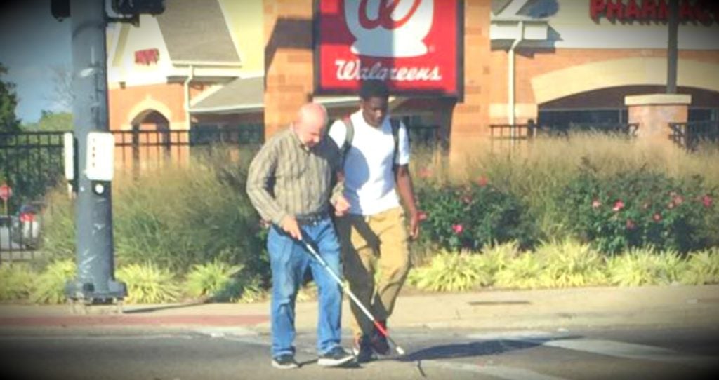 godupdates teen helps blind man cross a busy intersection fb