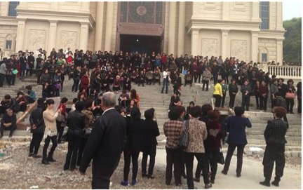 Church members create a 24/7 human chain to stop demolition.