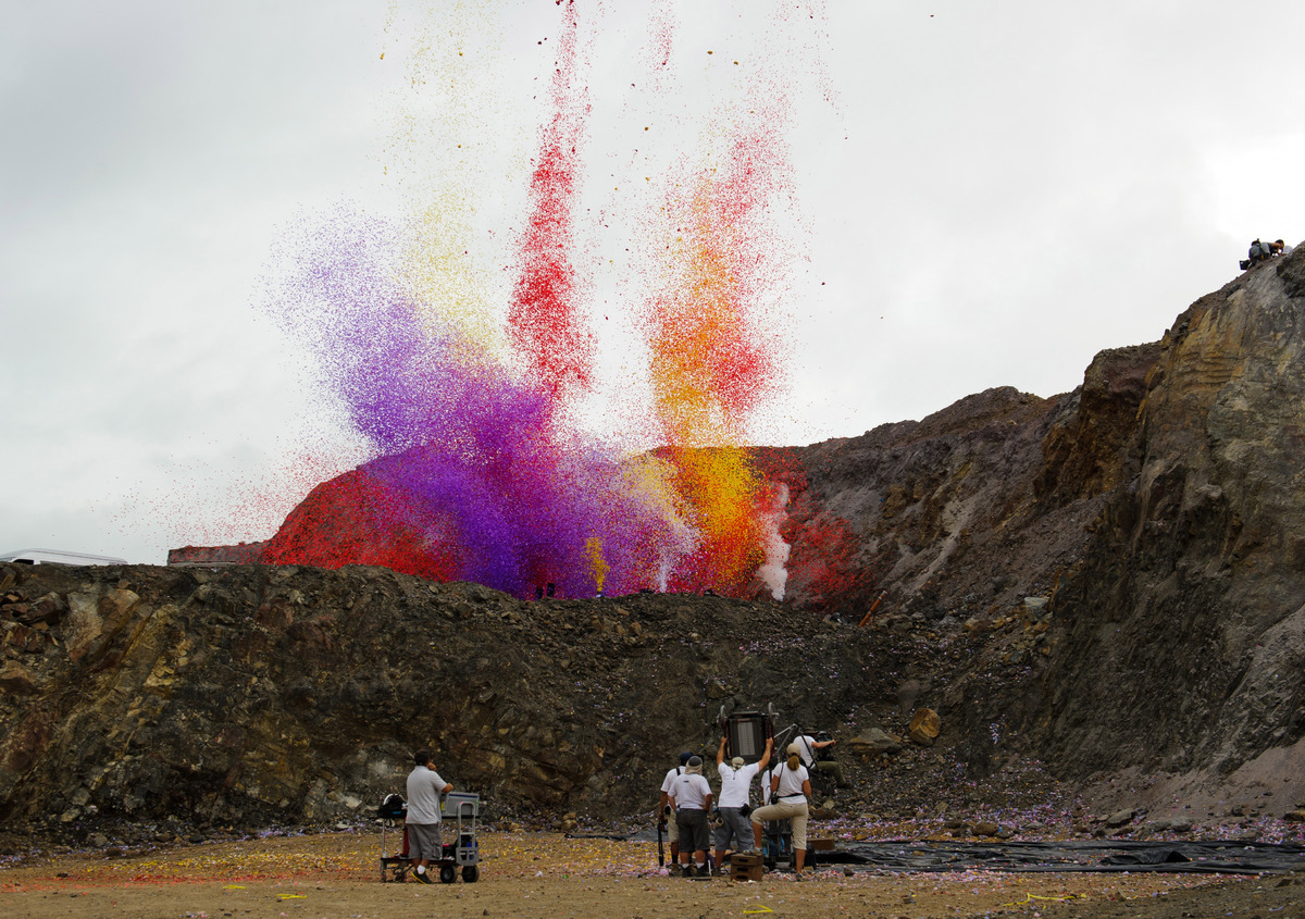 Volcano erupts many different color flower pedals. 