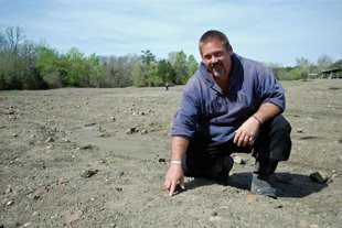 David Anderson shows where he found the diamond. 