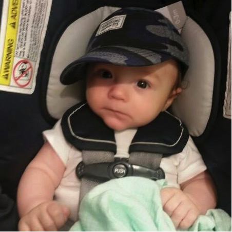 flight attendant keeps baby happy