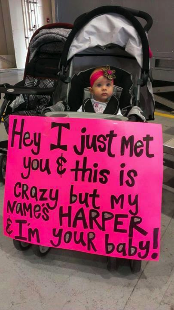 Adorable Baby Harper Holds Up a Sign to Greet Her Daddy