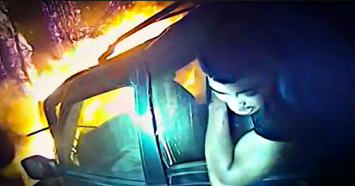 Terrifying Bodycam Footage Of A Police Officer Rescuing A Man From A Burning Car 5188